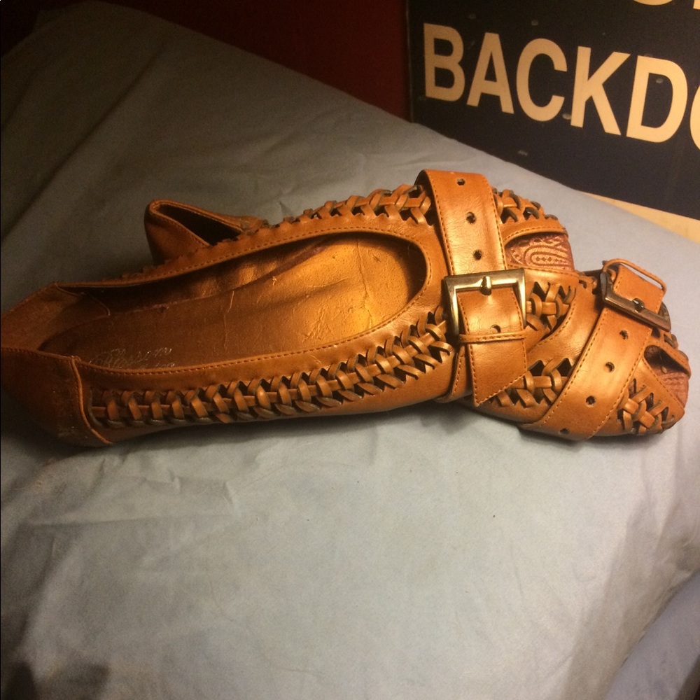 Brown leather flats